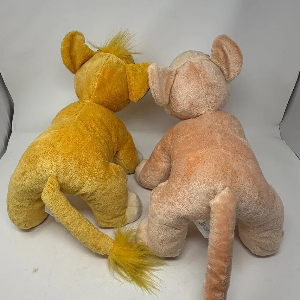 The Disney Store set of 2 stuffed animals young Nala Simba Lion King plush